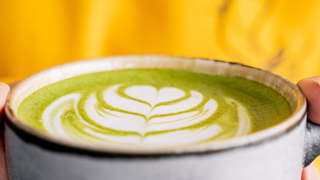 Stirring matcha in a cup