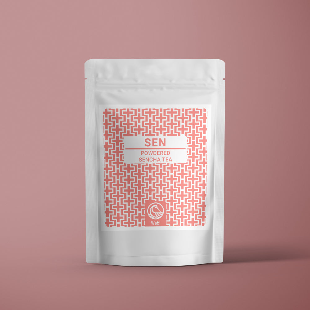 Wabi Matcha Sencha Tea Pouch on pink background