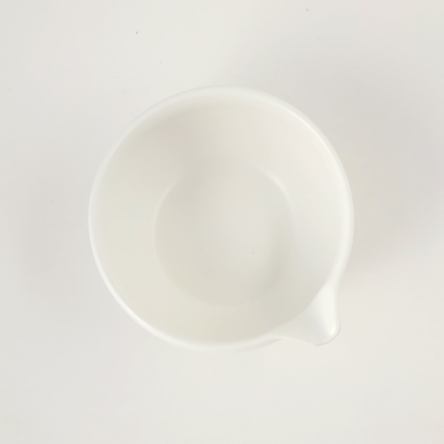 A top view of a classic White Chawan with pourer