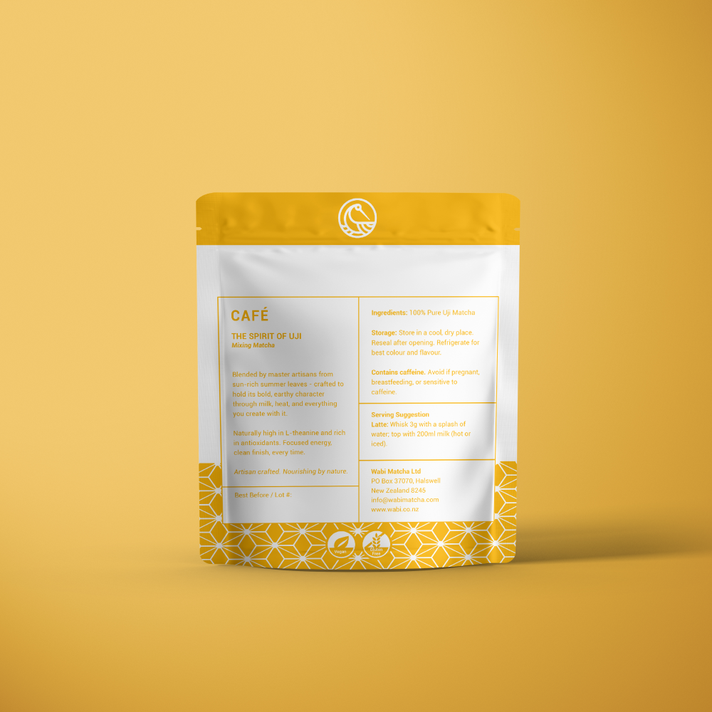 Wabi Cafe Mixing Matcha 50g pouch from back showing key information and put against a yellow background