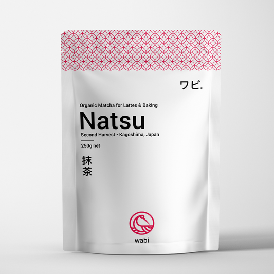 Wabi Matcha 250g Pouch of Natsu Second Harvest Kagoshima Matcha for Lattes and Baking standing against a white background.
