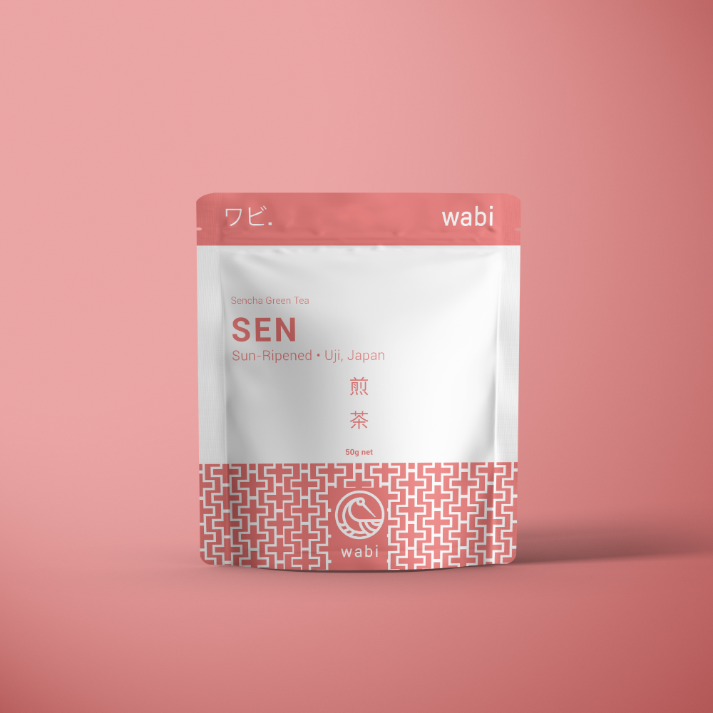 Sen Powdered Sencha Tea 50g Pouch on a pink background- Fresh & Invigorating Japanese Green Tea Powder